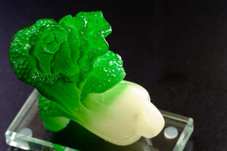Chinese cabbage jade carving, isolated on black backgroundの写真素材
