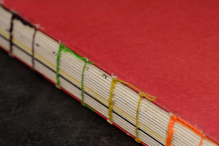 vintage style wire-bound book closeup viewの写真素材