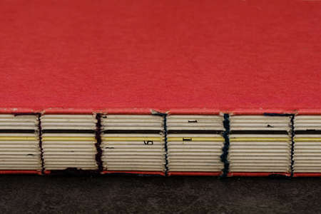 vintage style wire-bound book closeup viewの写真素材