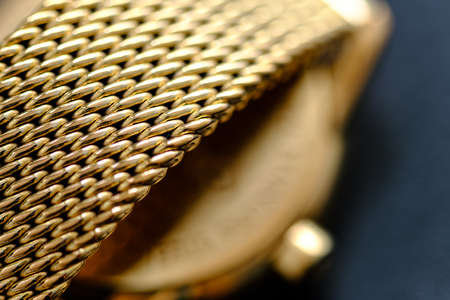 gold color Macro view of metal strap from watchの写真素材