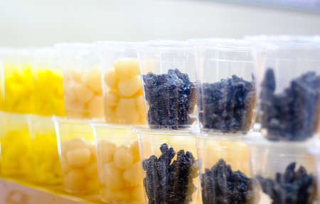 cup of dry fruit on shelf closeup viewの写真素材