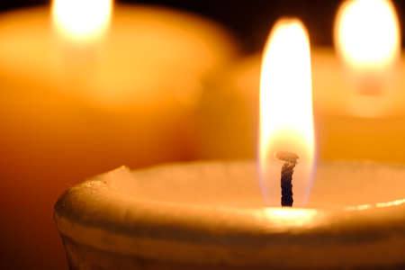 One candle flame at night closeup viewの写真素材