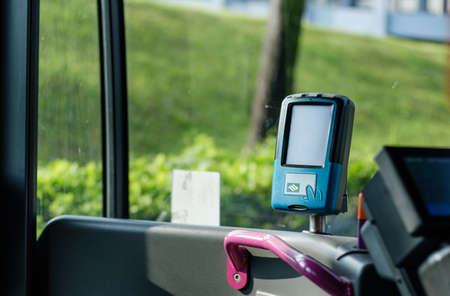 Singapore-10 MAR 2020: machine to slide a card to pay for public transport in Singaporeのeditorial素材