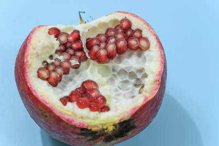 Pomegranate slice with berries macro closeup viewの写真素材