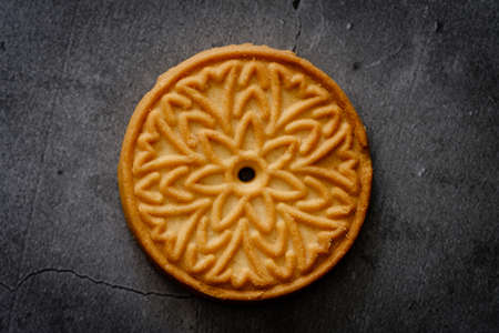 butter cookies isolated on black background viewの写真素材
