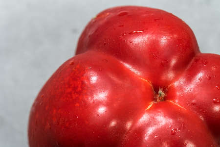 Big red pepper on white background isolatedの写真素材