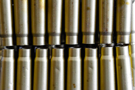 bullet shell cartridges on a black backgroundの写真素材