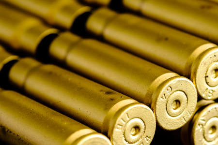 bullet shell cartridges on a black backgroundの写真素材
