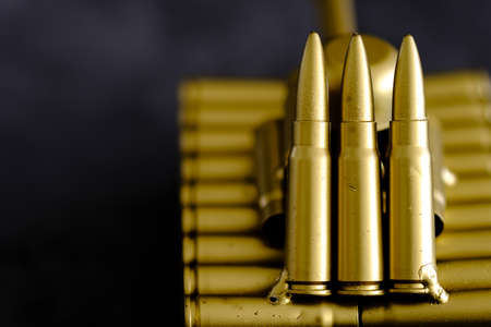 bullet shell cartridges on a black backgroundの写真素材