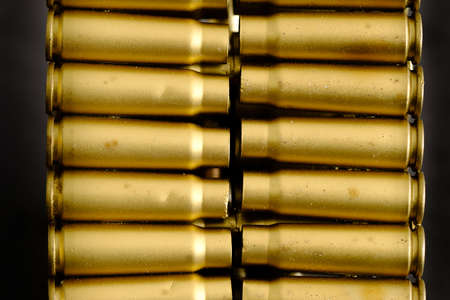 bullet shell cartridges on a black backgroundの写真素材