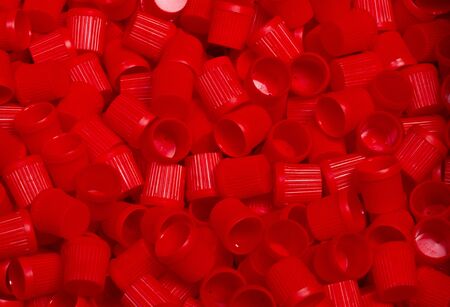 close-up of component caps, lids, tubes for aerosol cans and sprayers of chemicals and perfumes....