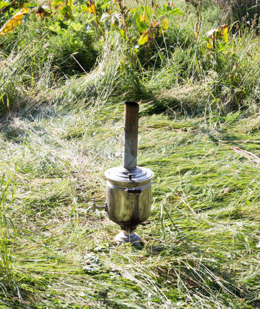 The samovar standing in a clearing in the smoke.の写真素材