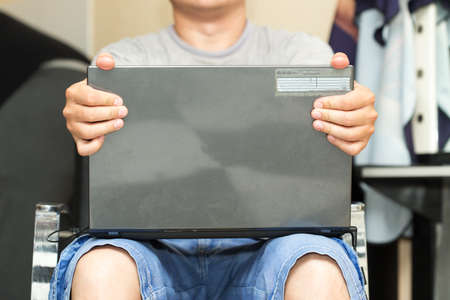 a man with a laptopの写真素材