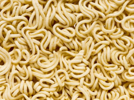 Raw food noodles on the tableの写真素材