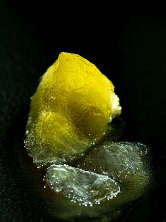 Cola ice crystal turns a beautiful brown backgroundの写真素材