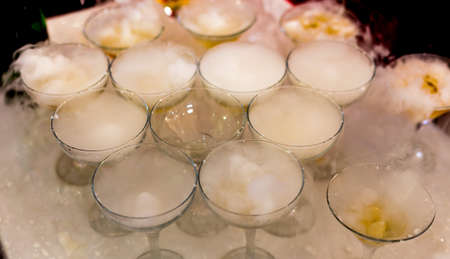 mountain glasses of champagne, a bottle of stream