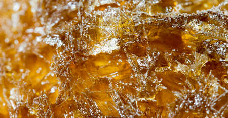 Cola ice crystal turns a beautiful brown backgroundの写真素材