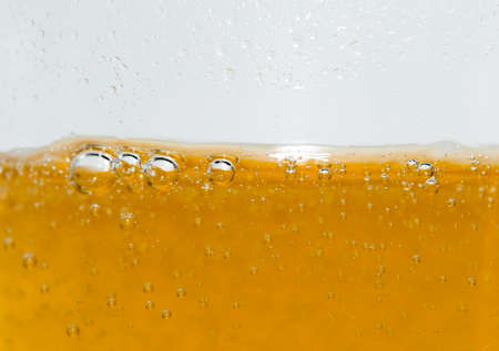 Fresh beer with froth and condensed water pearlsの写真素材