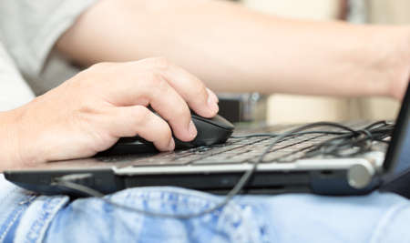 a man with a laptopの写真素材