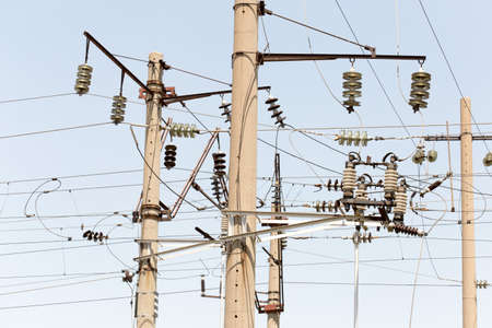 Railway electrification system. Overhead line wire over rail track. Power lines.の写真素材
