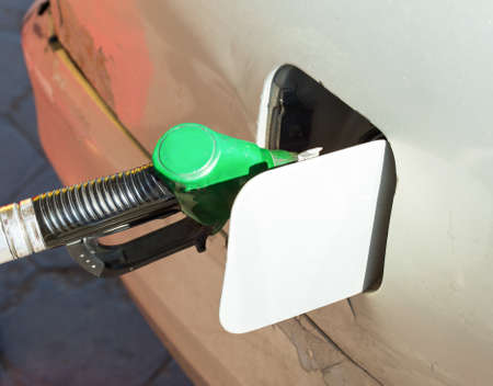 Gun petrol in the tank to fillの写真素材