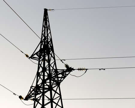 Electricity pylons at sunsetの写真素材