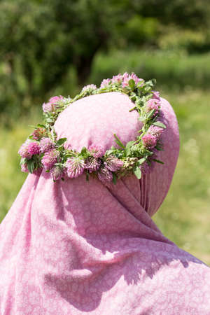 circle of flowers in the head girlの写真素材