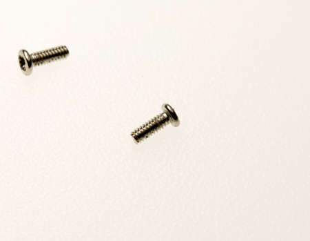 Two bolts closeup on white backgroundの写真素材
