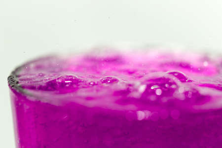 pink cocktail in a glass close upの写真素材