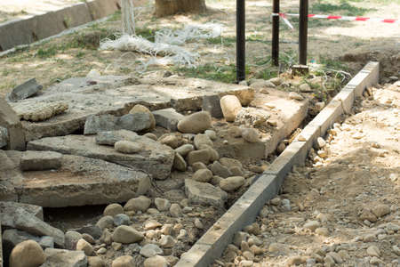 the curb, sidewalk, gravel, repair roads, repair of the surrounding groundsの写真素材