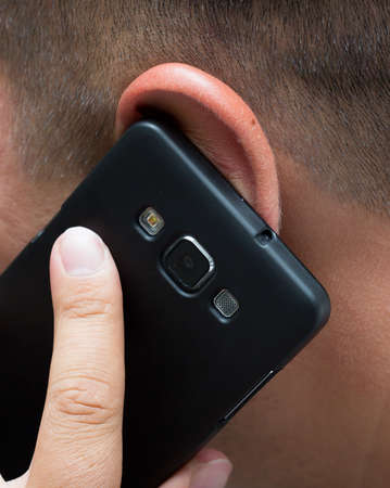 Man talking on the phone close up shotの写真素材
