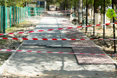 the curb, sidewalk, gravel, repair roads, repair of the surrounding groundsの写真素材