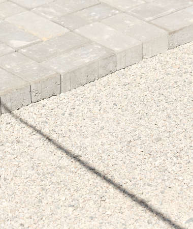 the curb, sidewalk, gravel, repair roads, repair of the surrounding groundsの写真素材