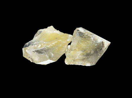 raw, yellow, precious stones on a black backgroundの写真素材