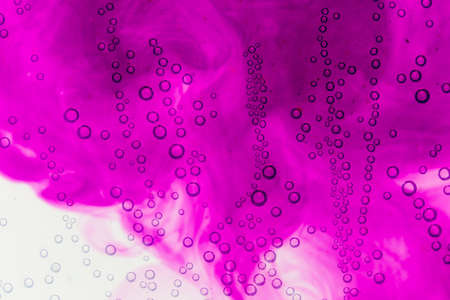 purple bubbles in water close-up abstract backgroundの写真素材