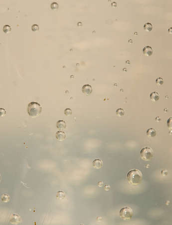 Water bubbles in a glass container close upの写真素材
