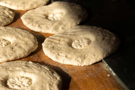 process of preparing Uzbek breadの写真素材