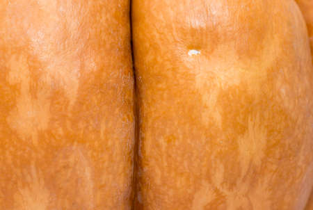Part of orange pumpkin, natural background