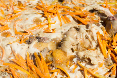 Cooking pilaf Uzbek nationalの写真素材