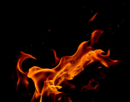 Fire flames on black backgroundの写真素材