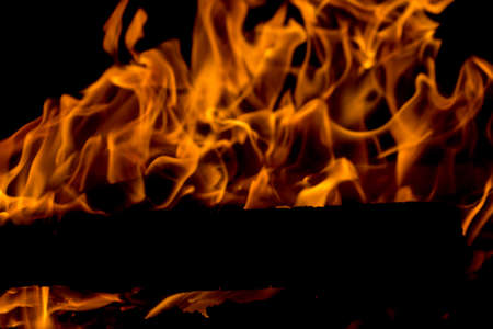 Fire flames on black backgroundの写真素材