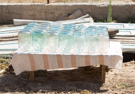 stylized glass jars under the sunの写真素材