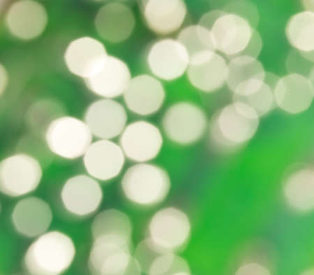 abstract green background bokeh circles on Christmas backgroundの写真素材