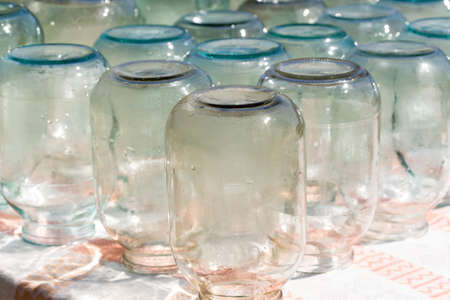 stylized glass jars under the sunの写真素材
