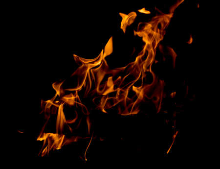 Fire flames on black backgroundの写真素材