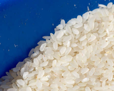 Uncooked white rice backgroundの写真素材