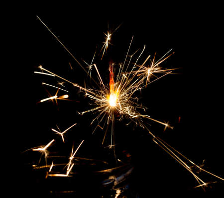 Christmas and newyear party sparkler on blackの写真素材