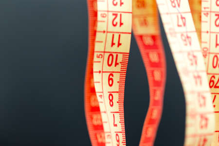 Meter for sewing on black macroの写真素材