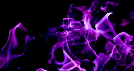 Purple fire flames on a black backgroundの写真素材