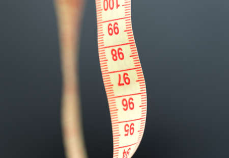 Meter for sewing on black macroの写真素材